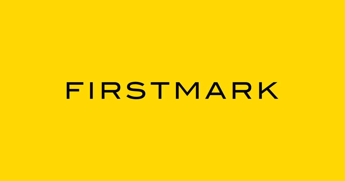 Firstmark logo on bright yellow background